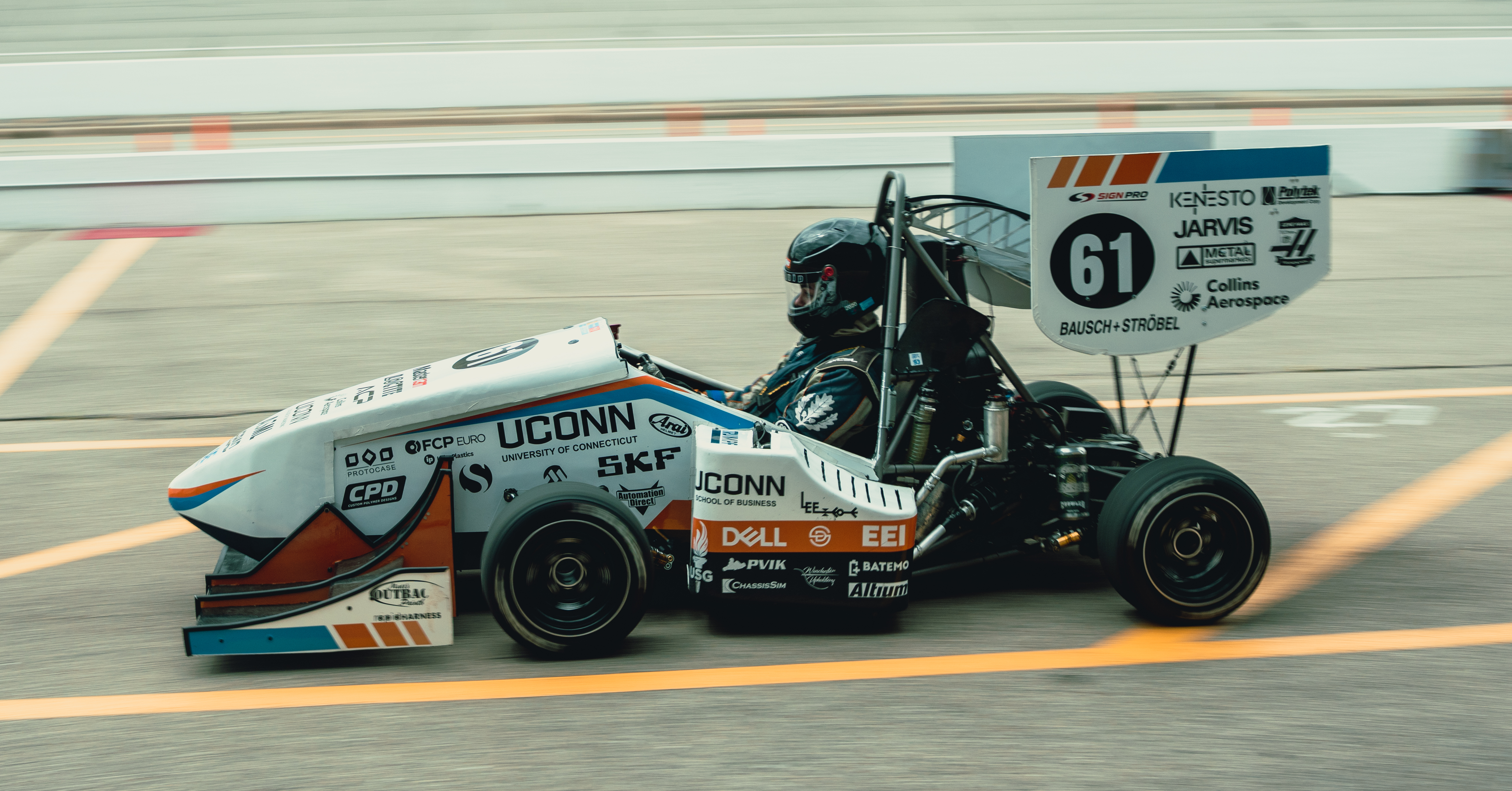 UConn FSAE cars on track